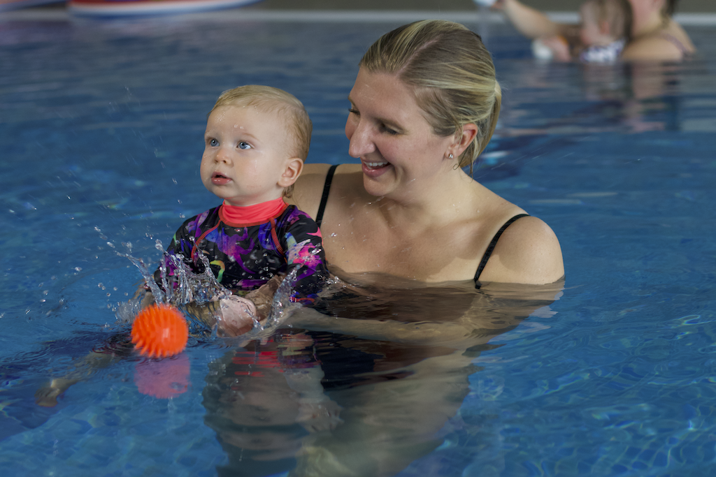 becky adlington in the pool with a child